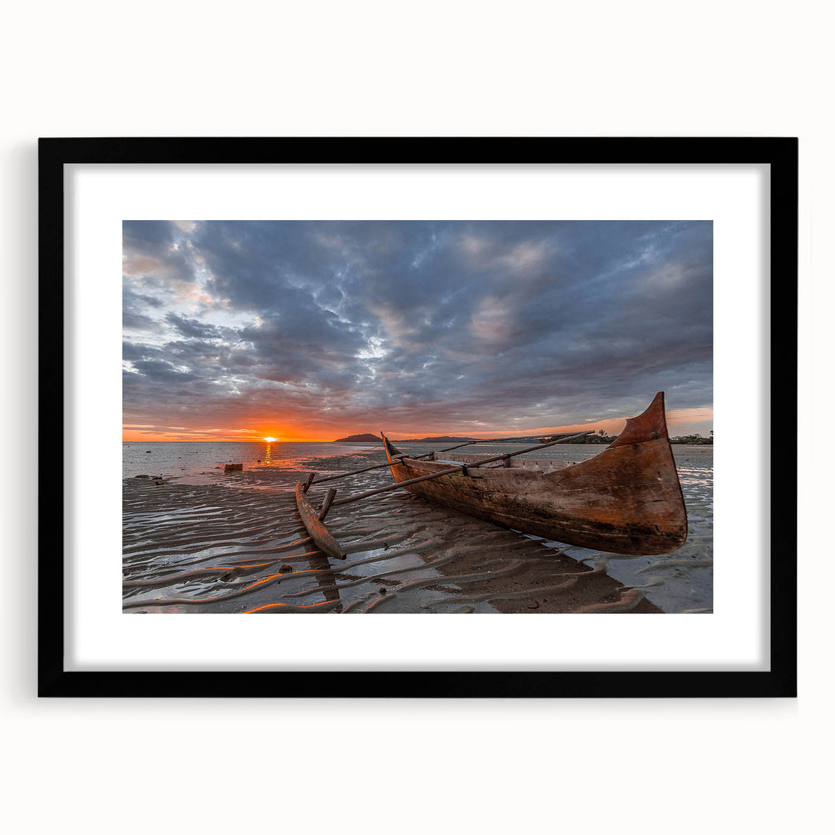 Extra large wall art depicting abstract, colorful art of Madagascar scenery in textured style, framed in black.
