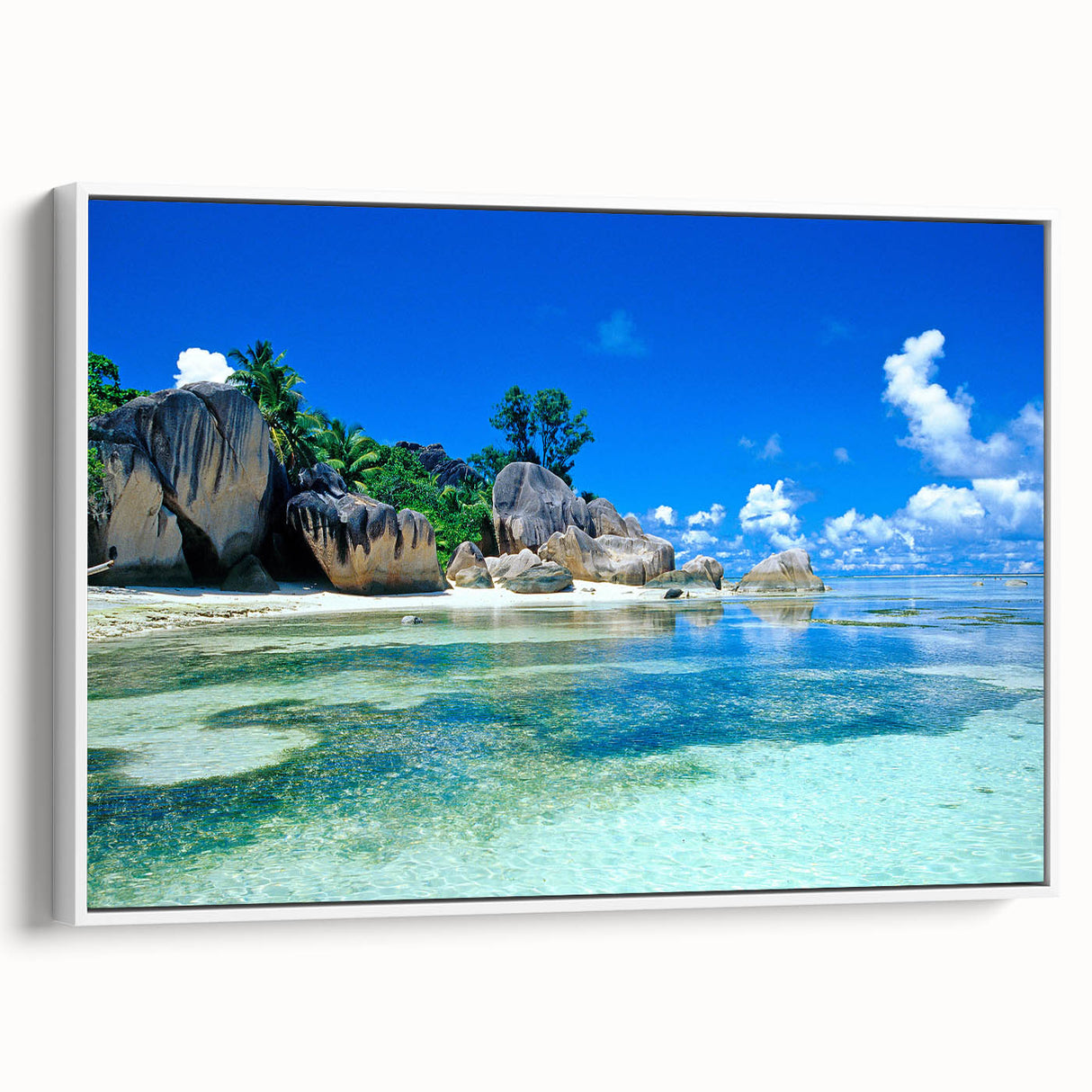 Framed canvas depicting a vintage poster art of Seychelles scenery in colorful hues, ideal for living room decor.