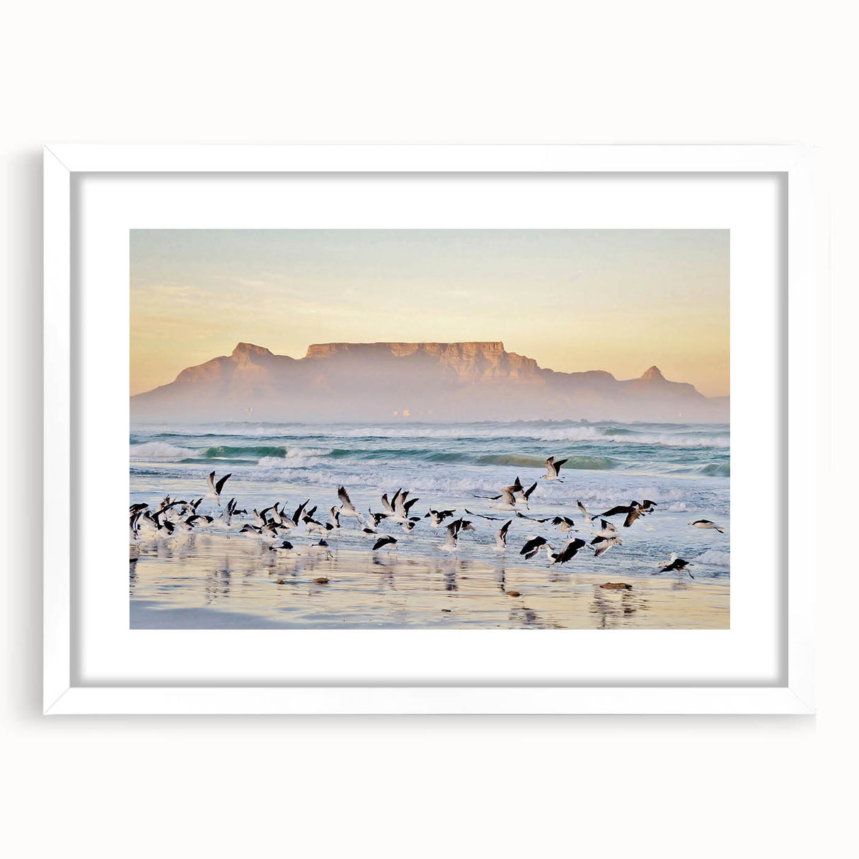 Abstract art print of an African landscape in earthy tones on a white framed canvas, suitable for dining room decor.