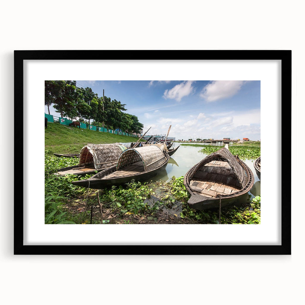 Extra large abstract art print featuring a vibrant, colorful scene of Bangladesh on a black framed canvas.