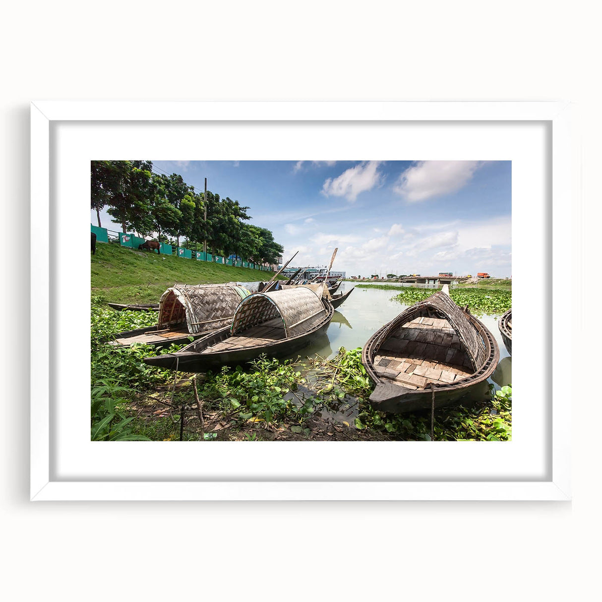 Abstract art print of a Bangladesh scenery in muted earth tones, framed with a white mat, ideal for dining room decor.