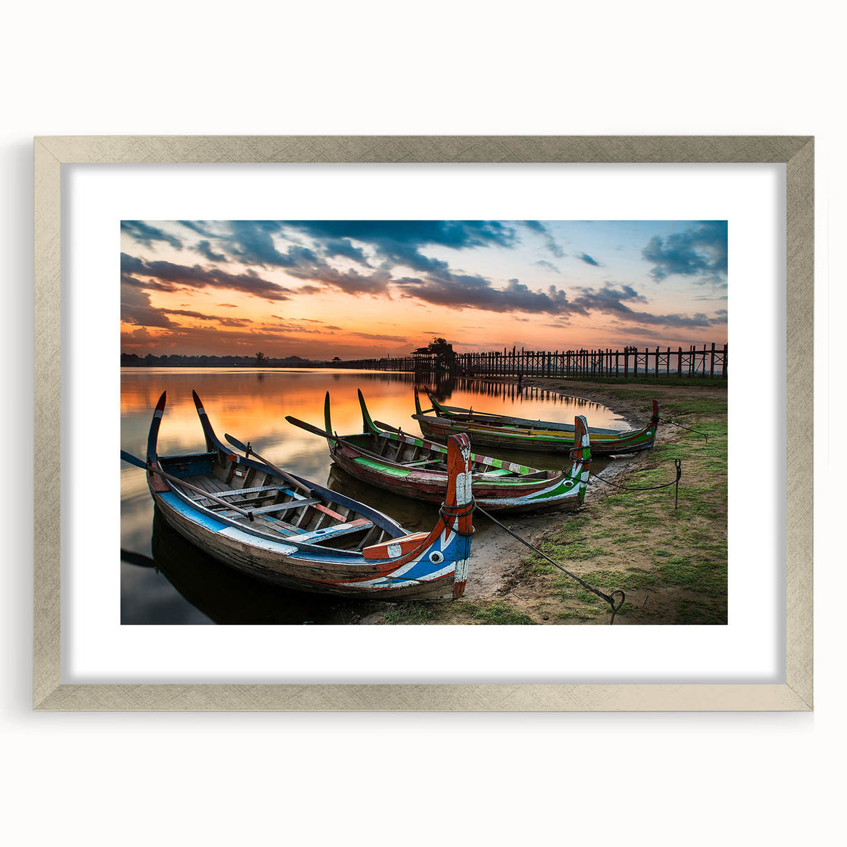 Textured abstract art print of a Myanmar scenery in muted earth tones, framed in silver, ideal for bedroom art.