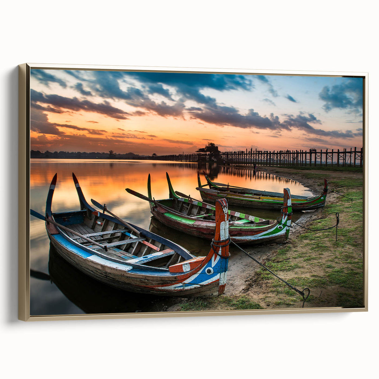 Framed canvas wall art depicting a vintage-style Myanmar landscape with predominant black and gold tones.