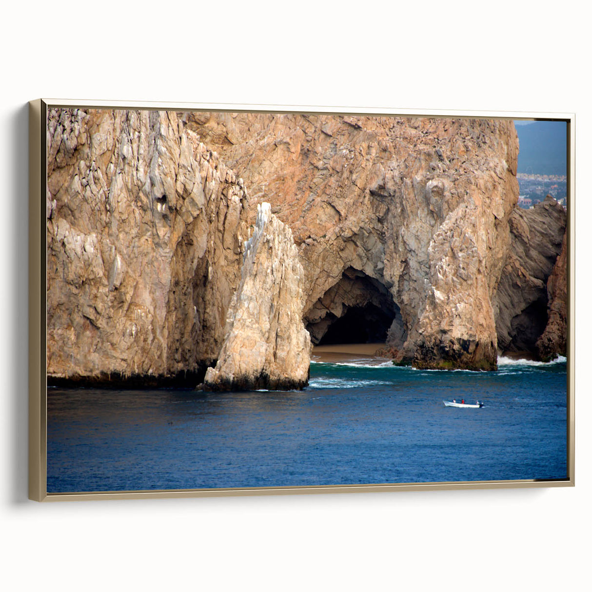 Framed canvas of a vintage-style landscape painting depicting Baja California, with muted earth tones.