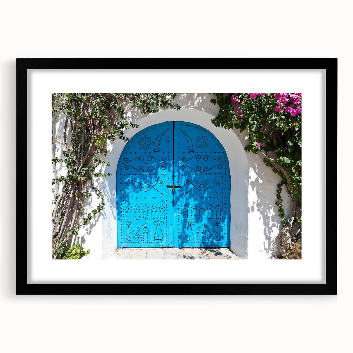 Extra large colorful art print of abstract African scenery in vibrant hues on textured canvas, framed in black.