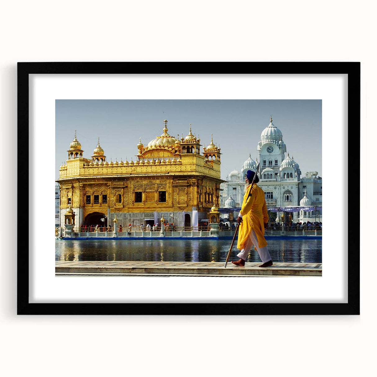Extra large abstract art print depicting vibrant, colorful Indian scenery on textured canvas, framed in black.