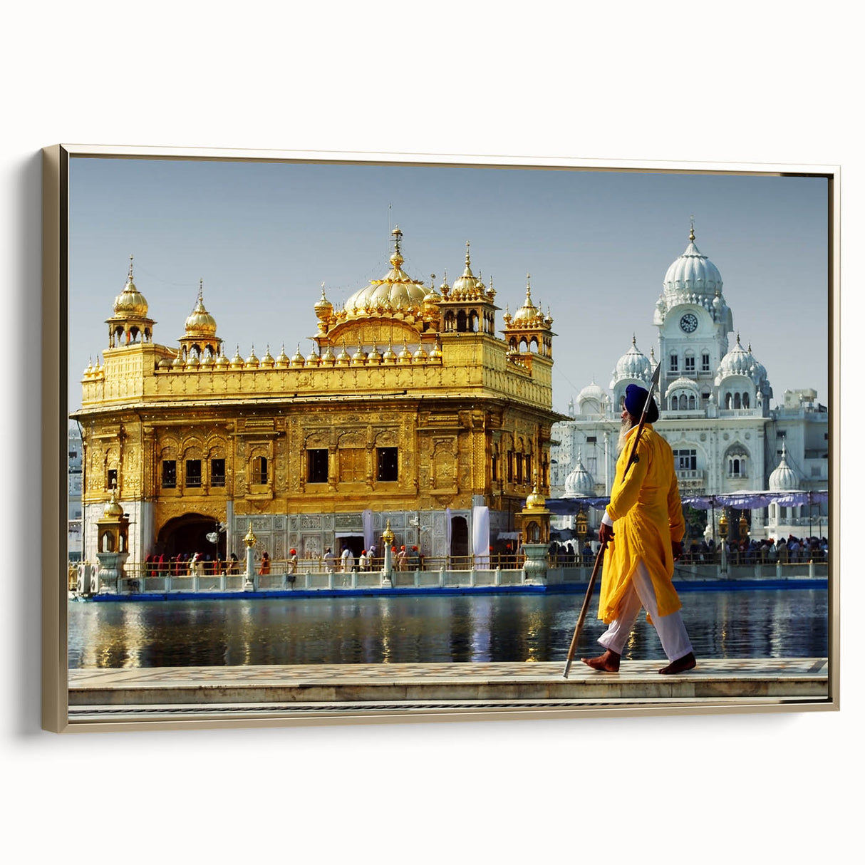 Framed canvas depicting a vintage-style Indian landscape in muted gold and black tones, ideal for bedroom wall art.