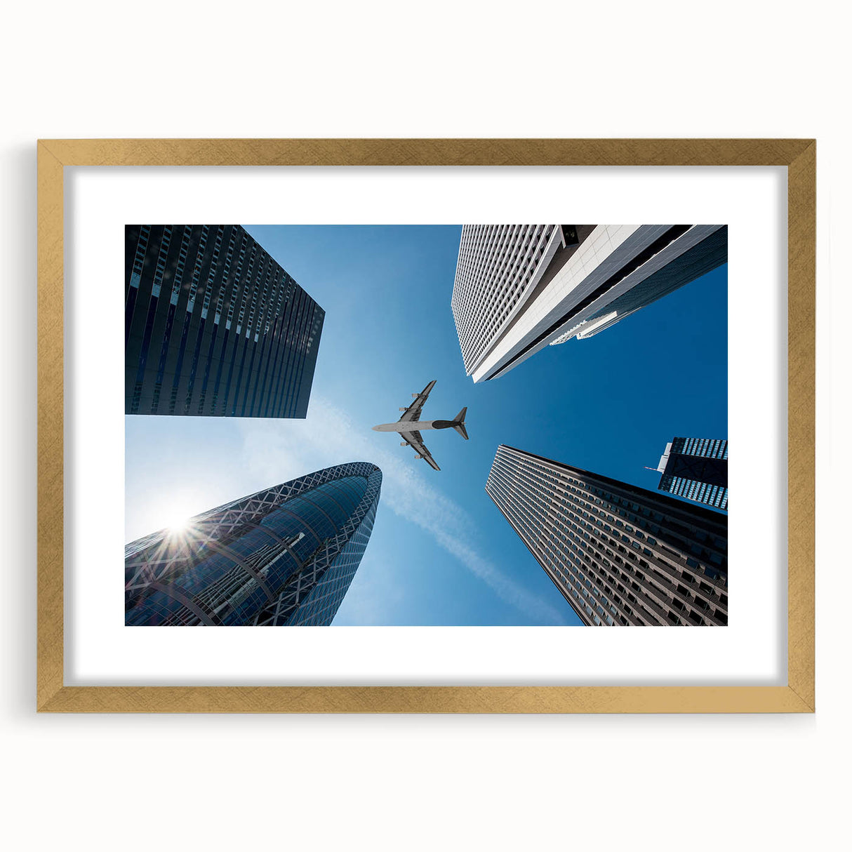 Extra large abstract art print depicting a textured Tokyo cityscape in muted gold and black tones on a framed canvas.