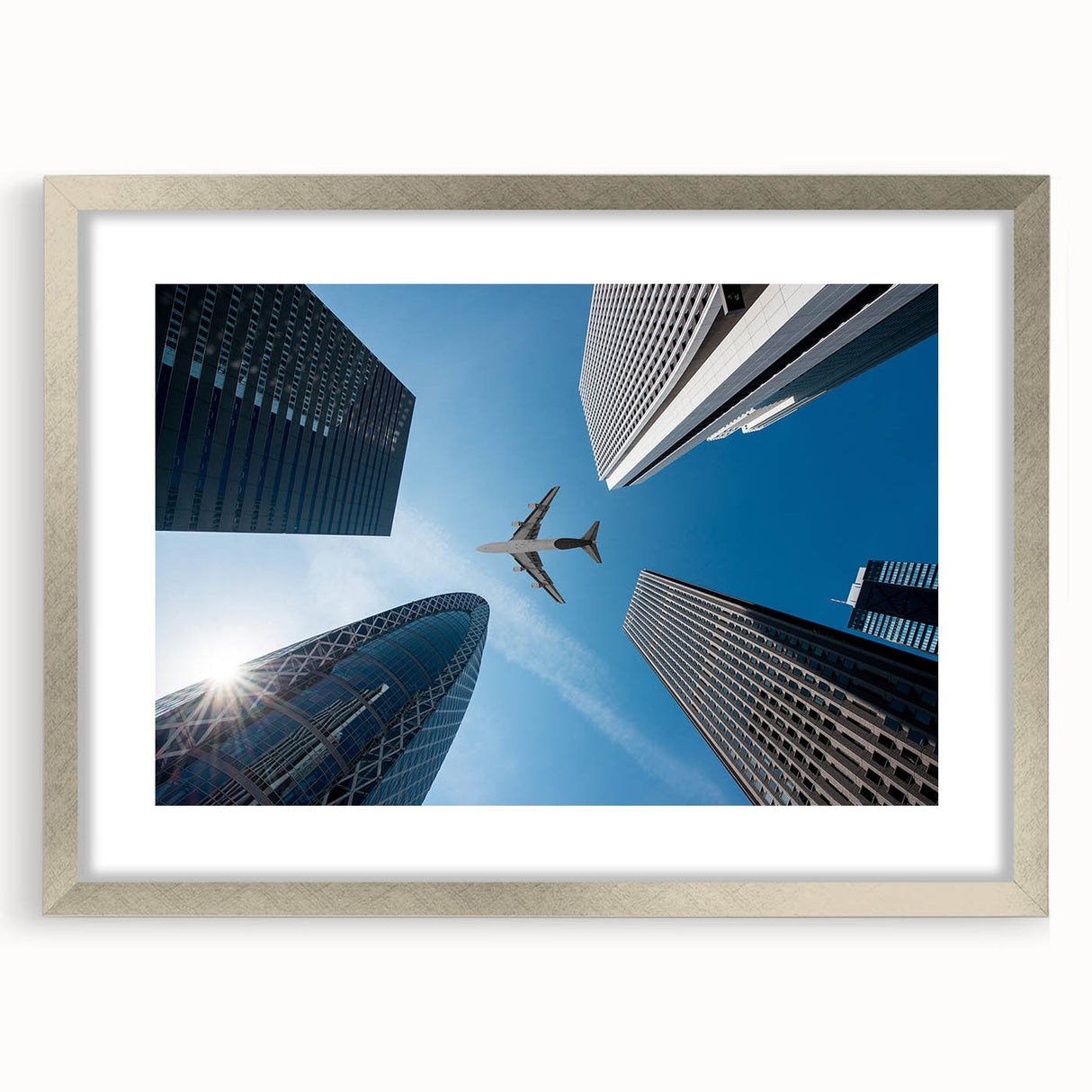 Textured abstract art print of Tokyo skyline in silver frame, ideal for bedroom art, featuring muted gray tones.