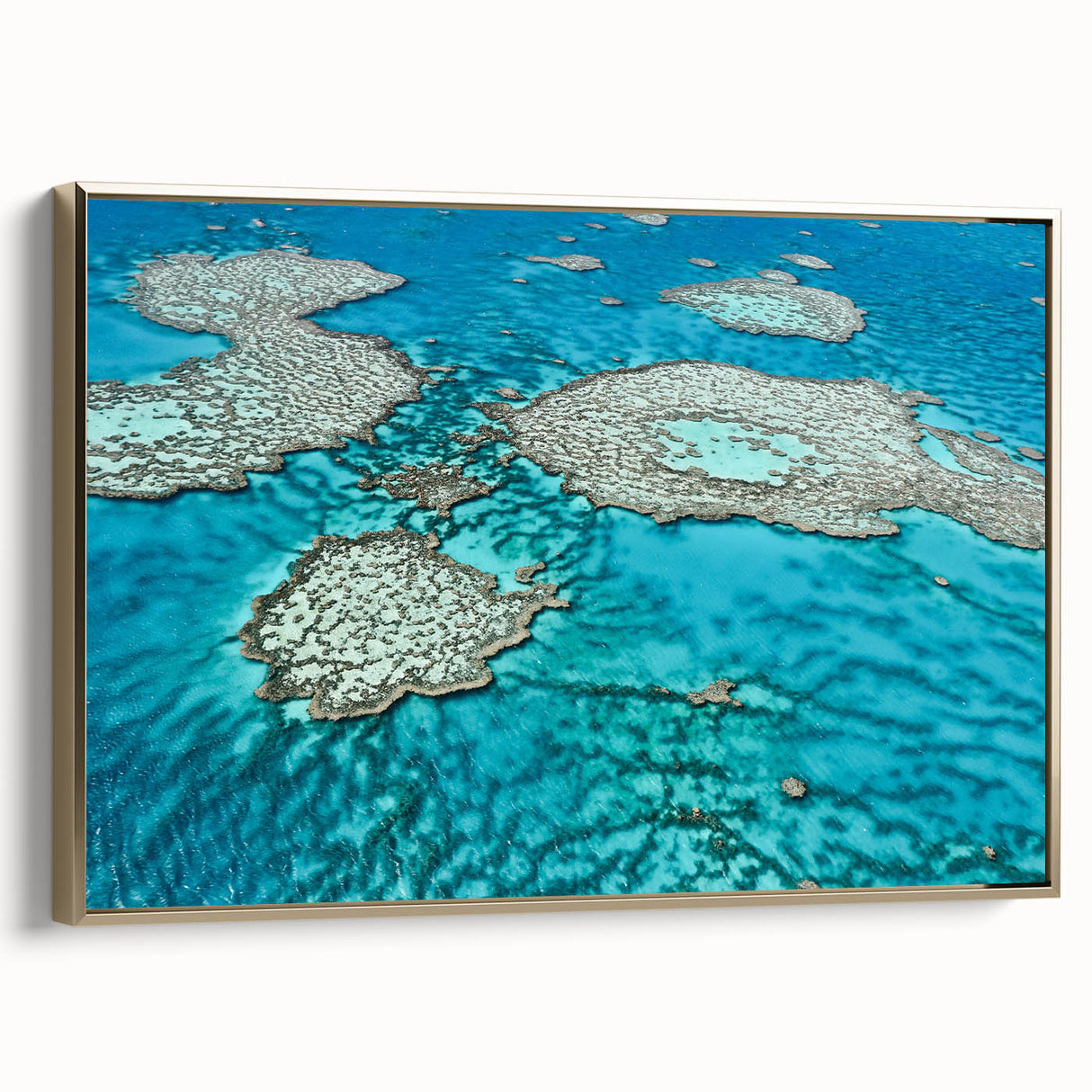 Framed canvas landscape art painting of the Great Barrier Reef with vibrant blue and green tones.