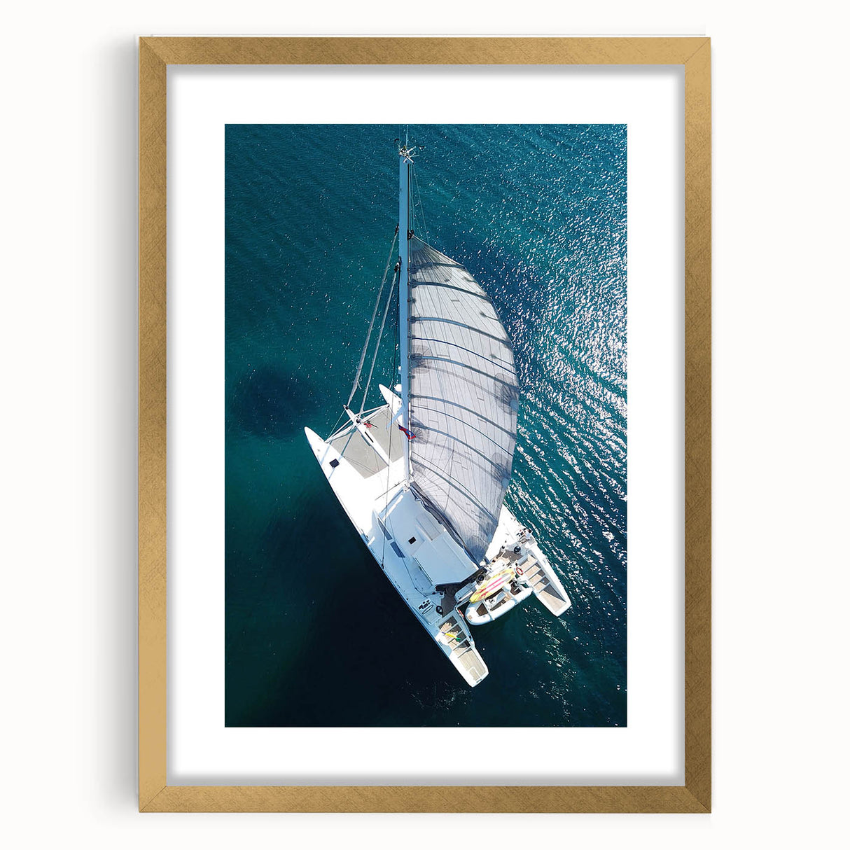 Textured art print of an abstract Caribbean seascape in vibrant blue and green hues on a framed canvas.