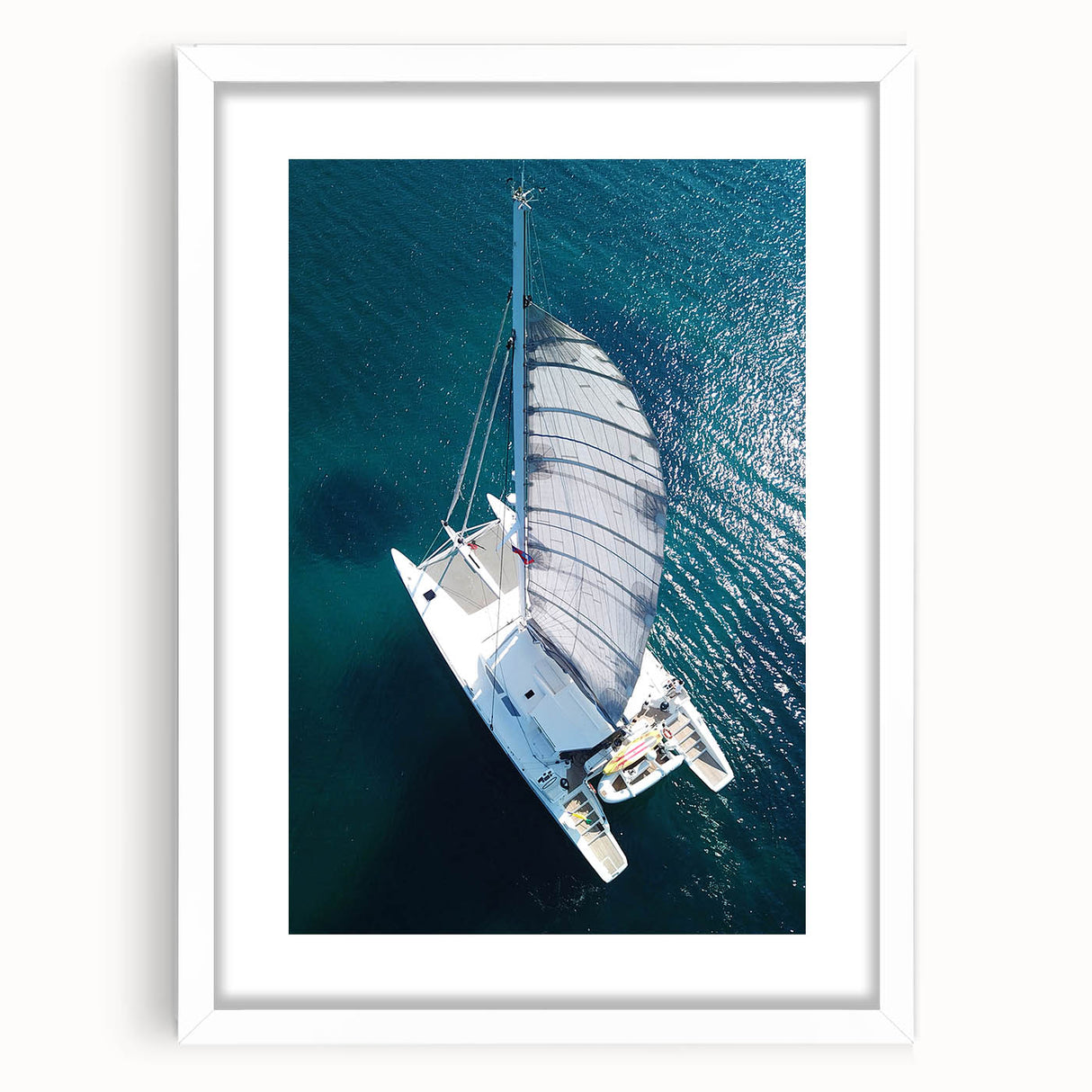 Extra large abstract art print featuring textured Caribbean scenery in vibrant blues and greens, framed with a white mat.