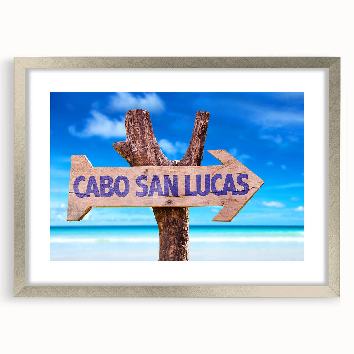 Textured art print of abstract Cabo San Lucas scenery in muted earth tones, framed in silver, ideal for bedroom decor.