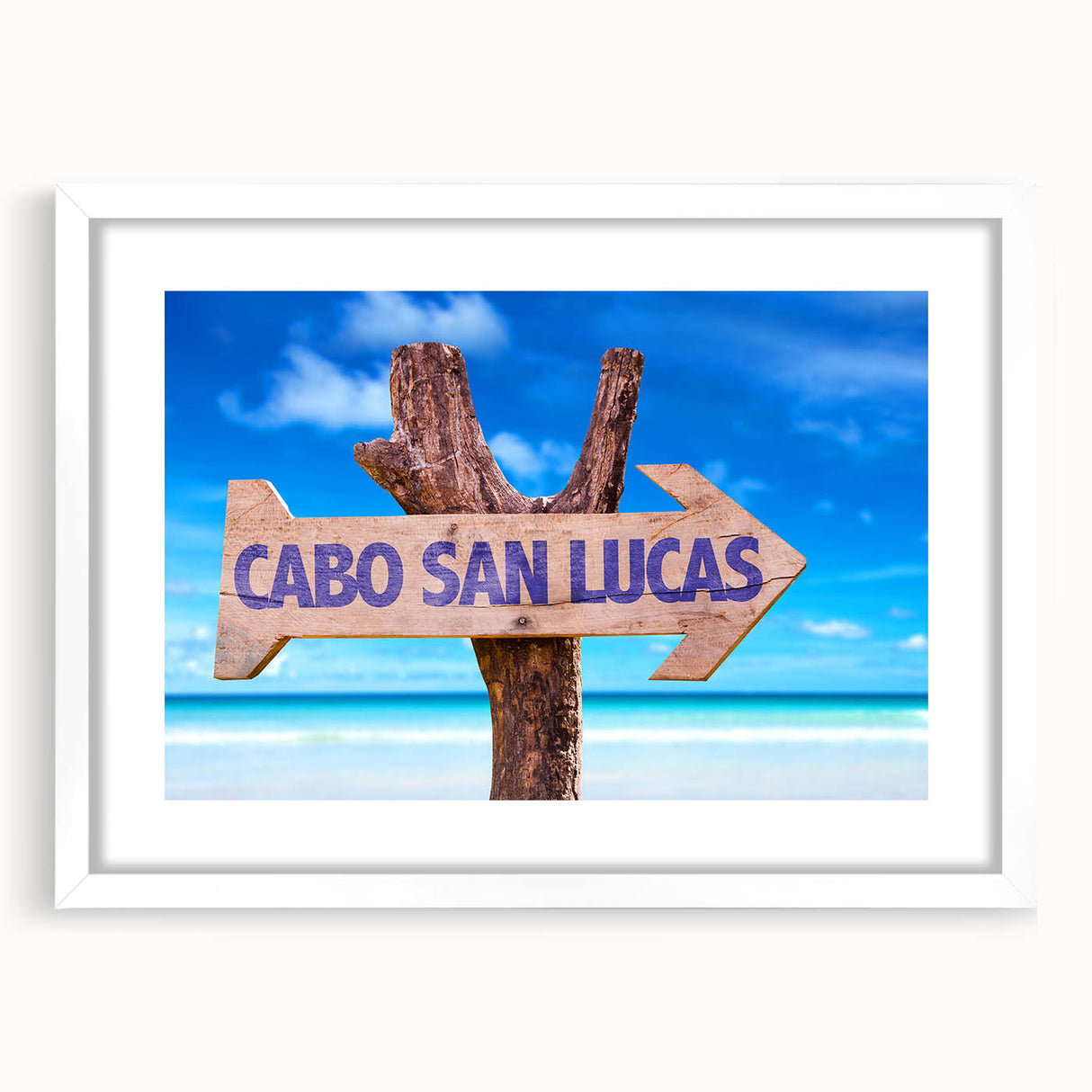 Abstract art print of Cabo San Lucas scenery in muted blue and white tones, framed with a white mat.