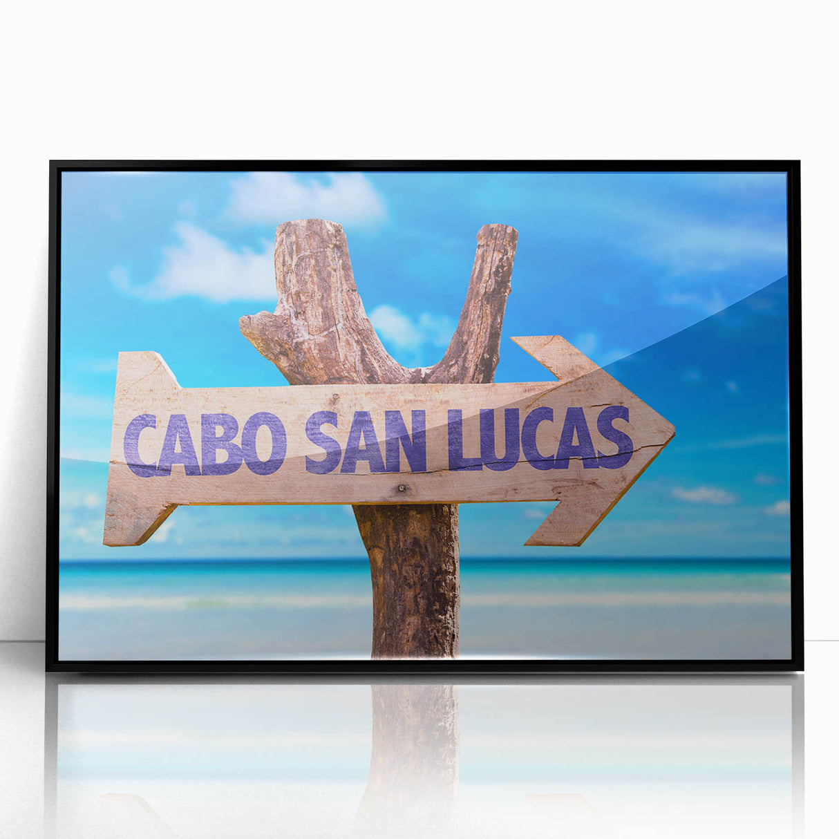 Large abstract wall art depicting the Cabo San Lucas coastline in muted blues and grays, framed in black acrylic.
