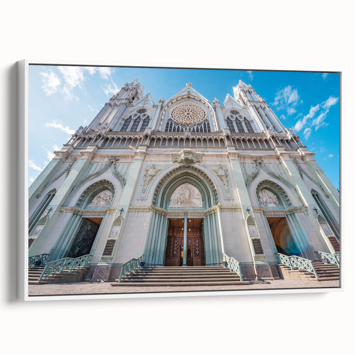 Vintage poster art of Guanajuato, Mexico featuring colorful buildings on a black framed canvas, ideal for living room decor.