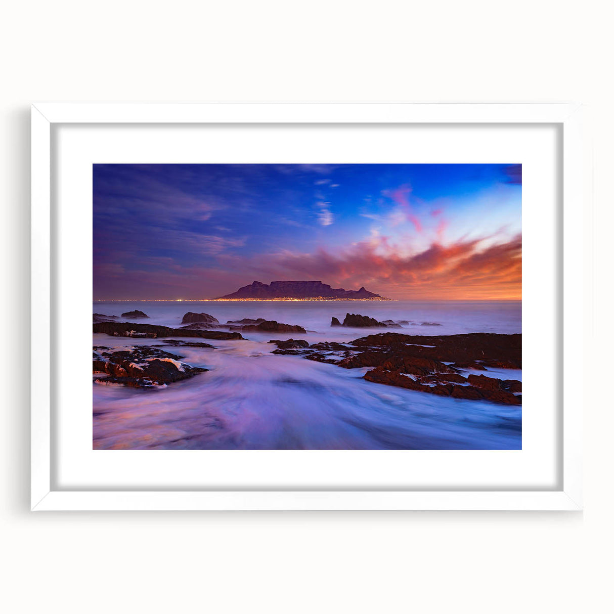 Abstract art print of a South African landscape in muted earth tones on a white-matted frame, suitable for dining room decor.