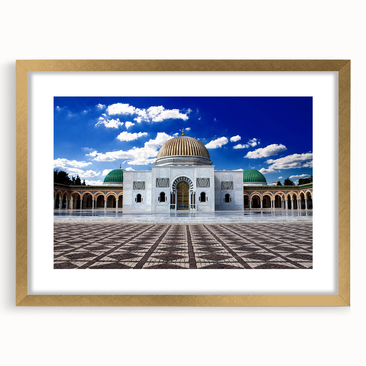 Extra large abstract art print depicting a textured Tunisian landscape in muted earth tones, framed in gold.