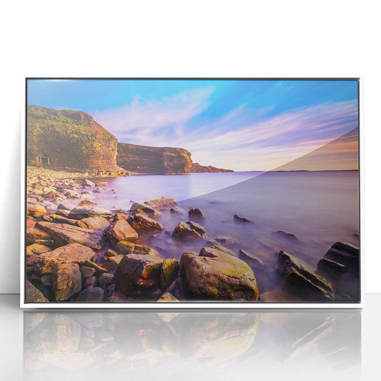 Acrylic print of a Newfoundland scenery with muted blue and green tones, framed in white, suitable for modern nursery decor.