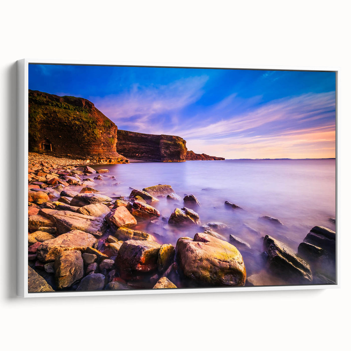 Vintage poster art of a Newfoundland scenery on a framed canvas, featuring a palette of colorful art.