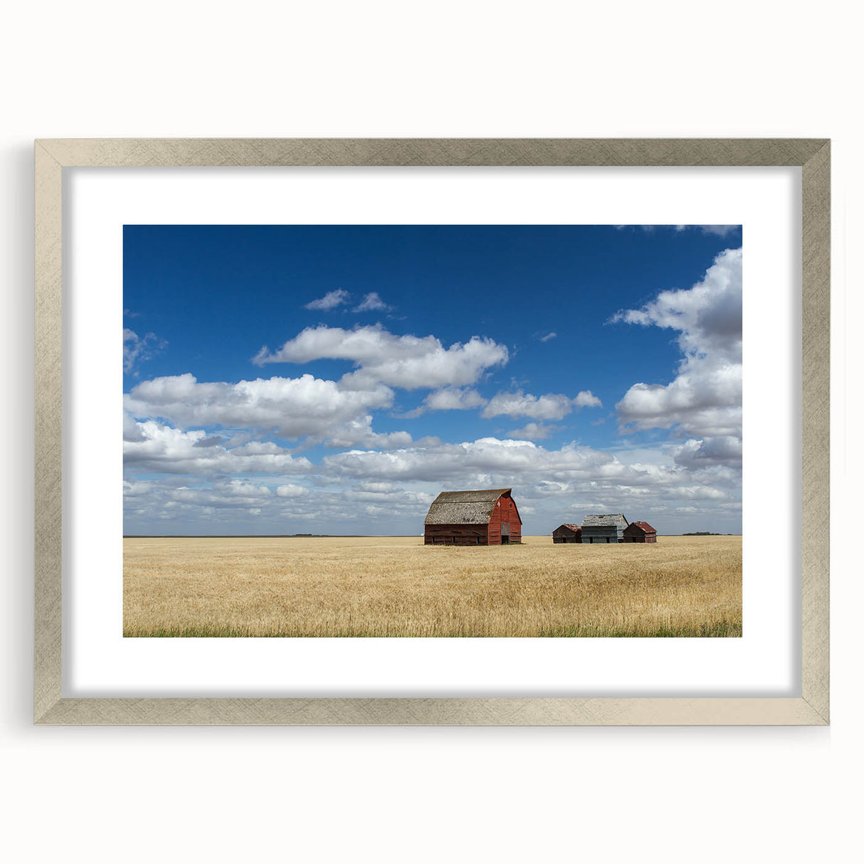 Textured art print of abstract Saskatchewan scenery in muted gray and blue tones, framed in silver, ideal for bedroom art.