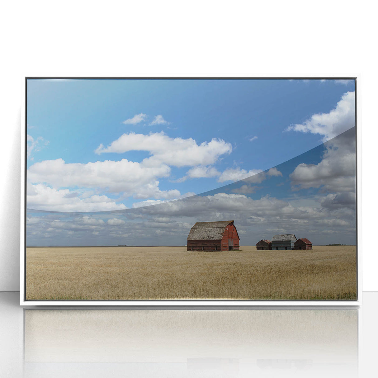 Acrylic print of a Saskatchewan landscape, with muted green and blue tones, framed in white.