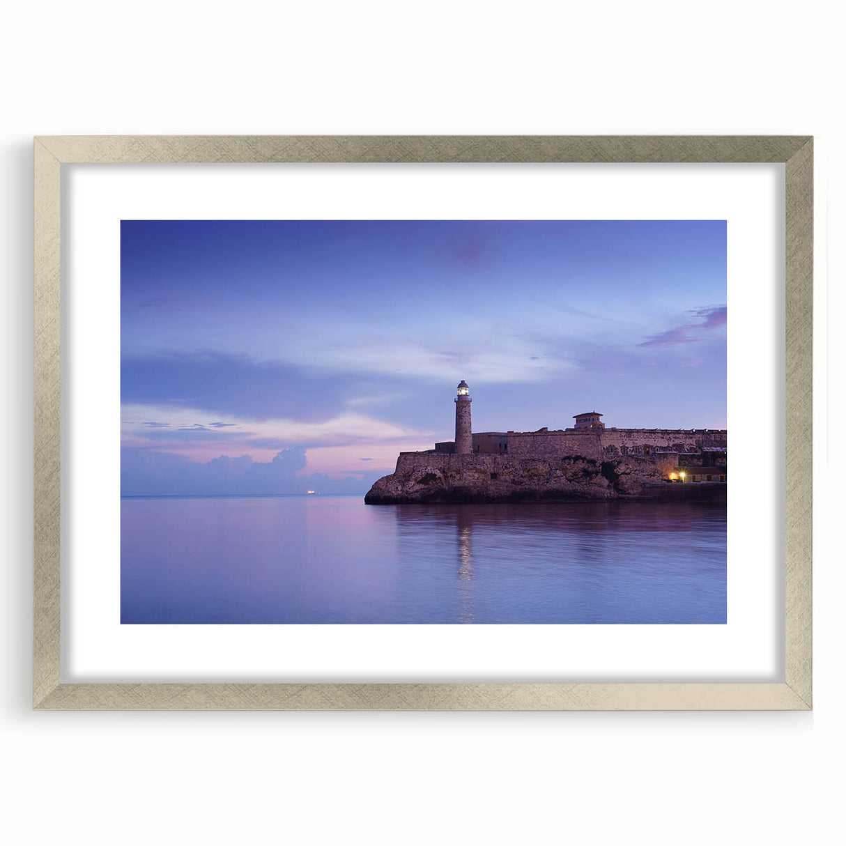 Extra large abstract art print of a Caribbean scene in textured hues of blue and green, framed in silver.