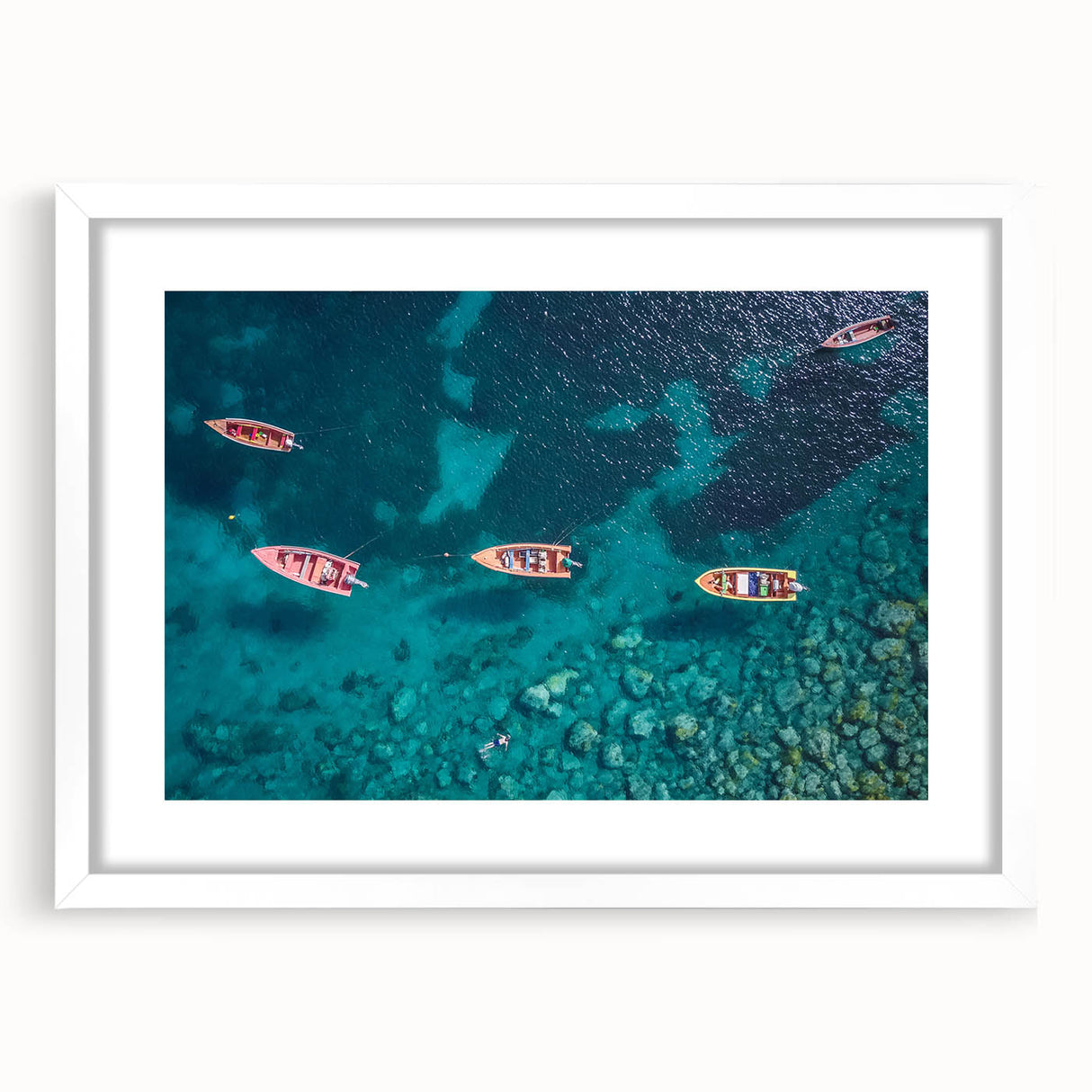 Textured abstract art print depicting Caribbean scenery in muted blue and green tones on a framed white matte canvas.