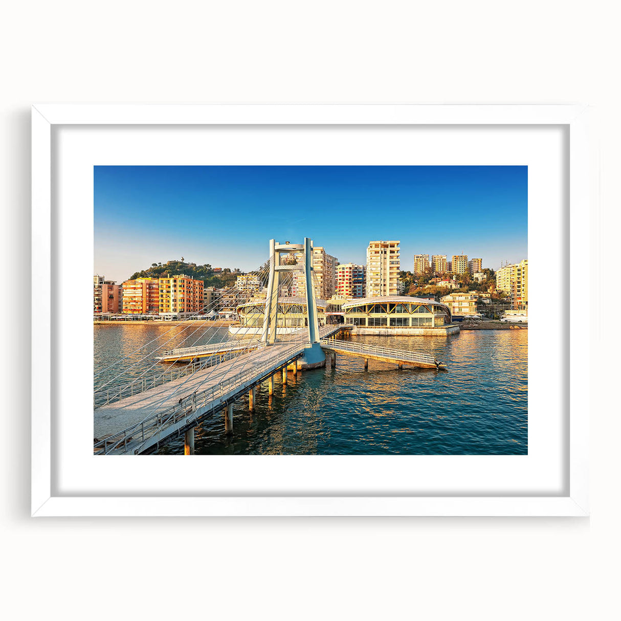 Textured abstract art print depicting a European scenery in muted earth tones, framed in white, ideal for bedroom art.