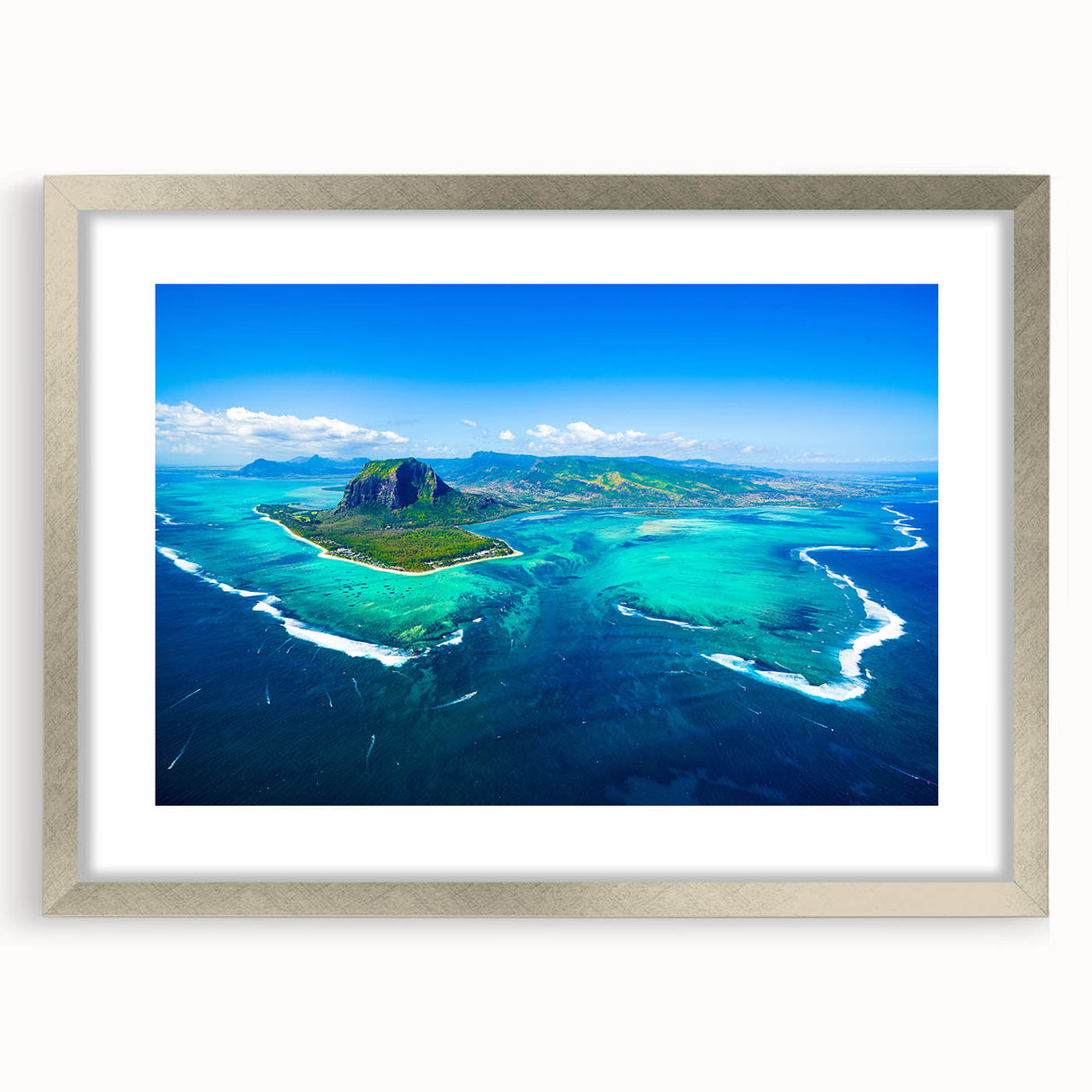 Abstract art print depicting a serene Mauritian landscape in cool blue and green tones, framed in silver.
