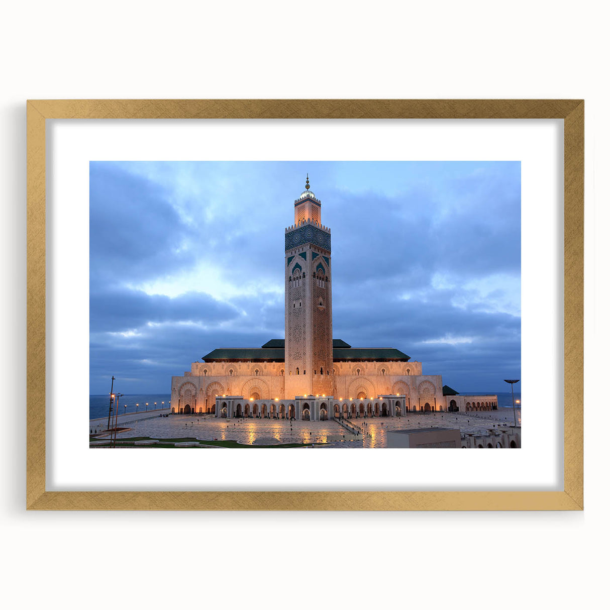 Textured abstract art print depicting a Moroccan landscape in earth tones, framed in gold, suitable for bedroom decor.