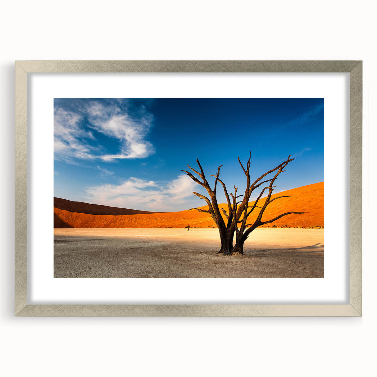 Abstract art print depicting a Namibian landscape in earth tones on a framed canvas.