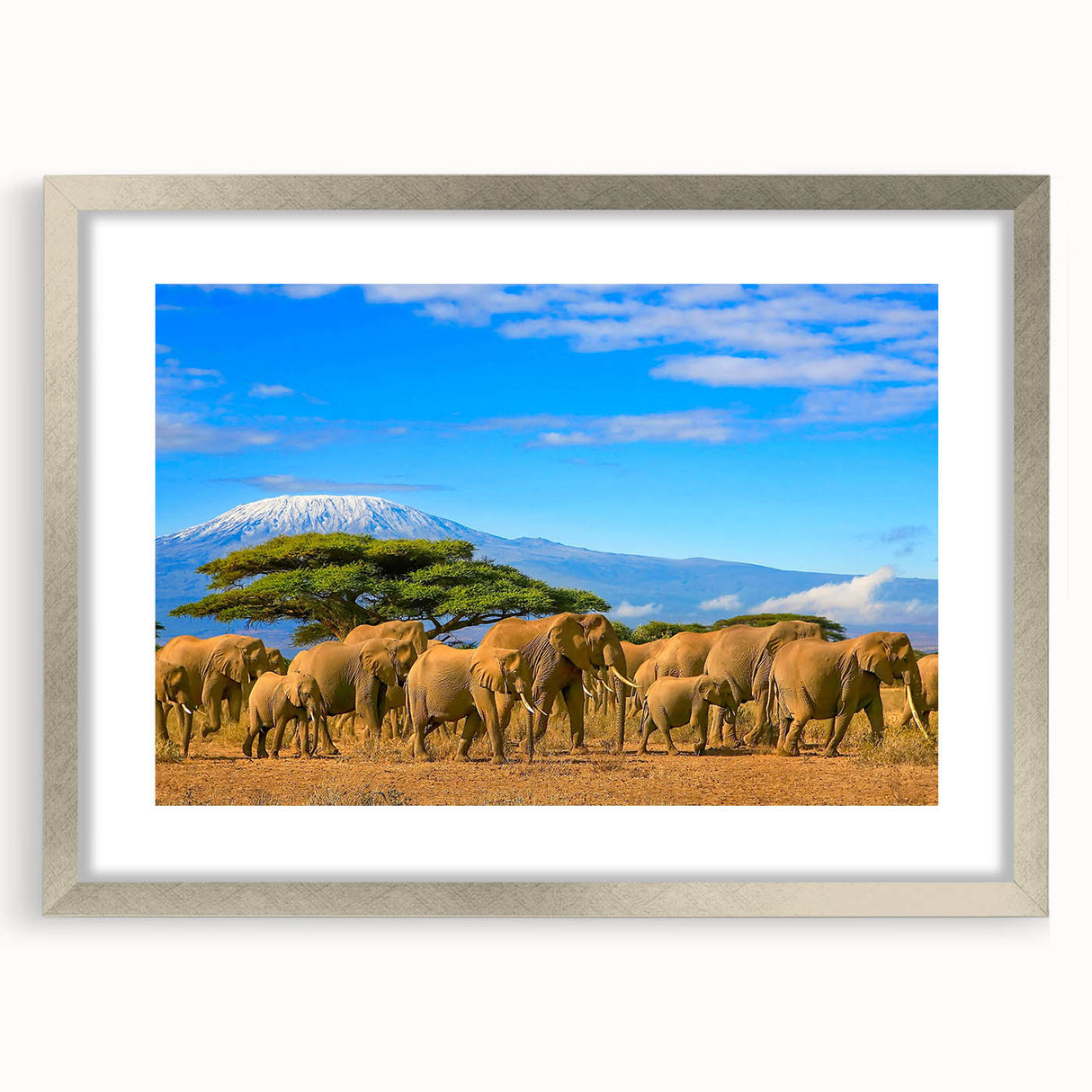Abstract textured art of African scenery in muted earth tones on a framed silver mat, ideal for bedroom art.