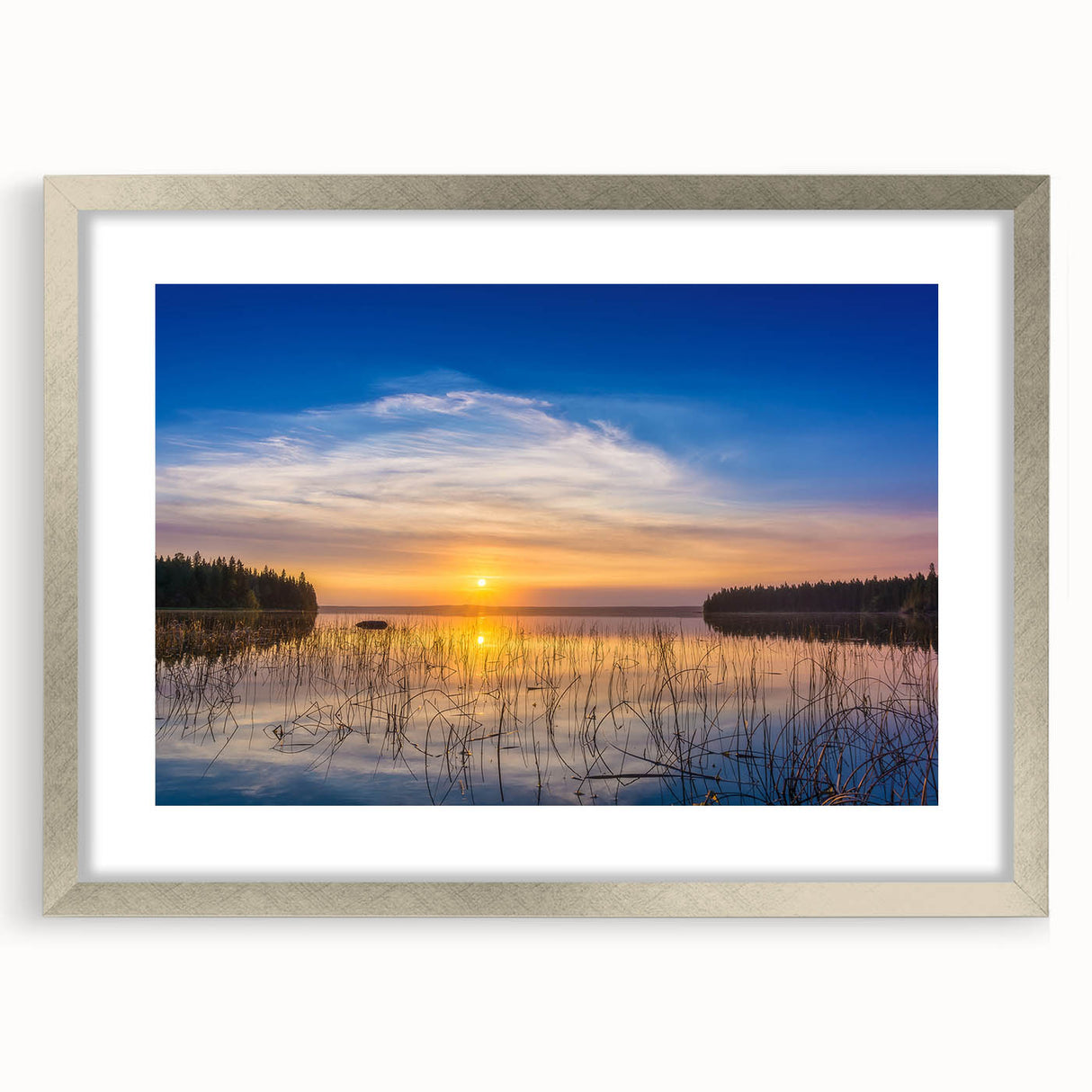 Textured art of abstract scenery in muted earth tones on a framed silver mat, ideal for bedroom decor.