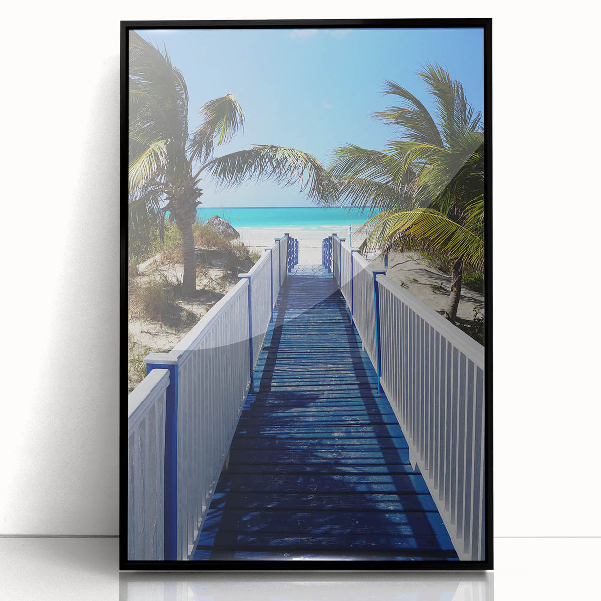 Large abstract wall art depicting a Caribbean Martinique scenery in muted blue and green tones on a framed acrylic print.