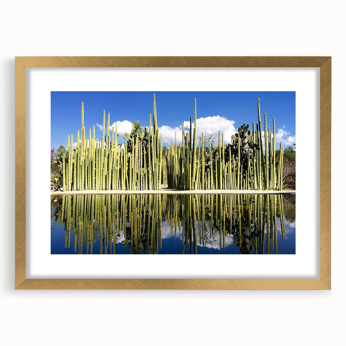 Extra large abstract art print of Oaxaca scenery in textured style, with vibrant earth tones, framed in gold.
