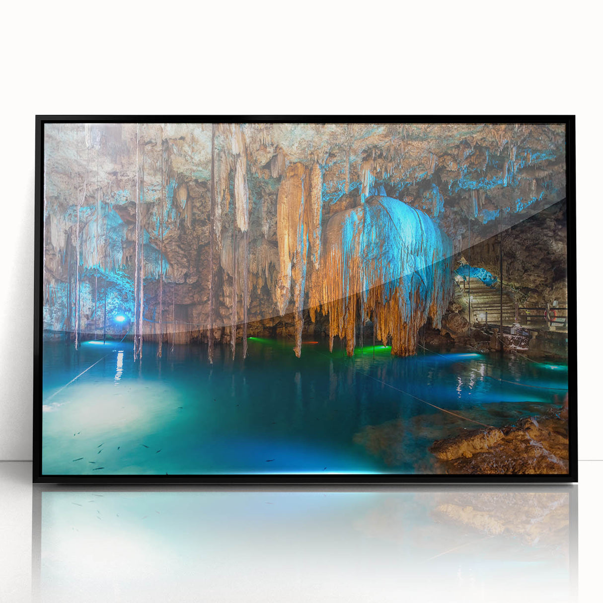 Large abstract wall art depicting a Yucatan scenery in vibrant colors on a black-framed acrylic print.