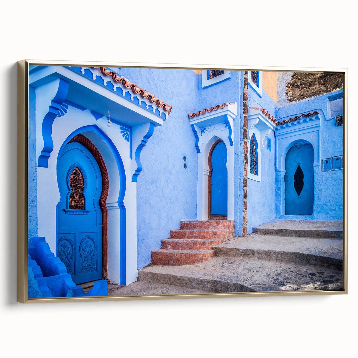 Framed canvas landscape art painting depicting a Moroccan scenery in vibrant gold and black tones.