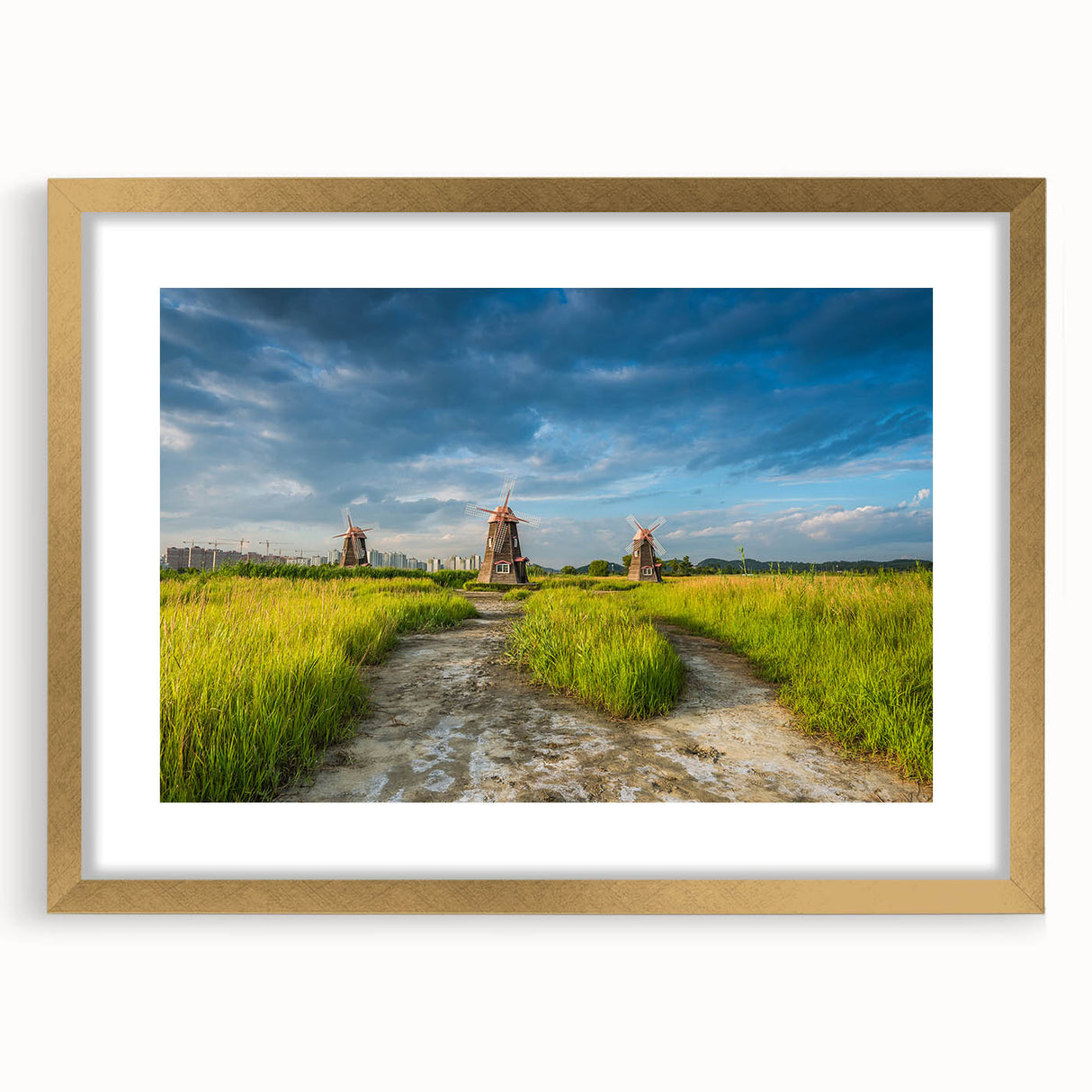 Extra large abstract art print depicting a textured scenery of Asia, in gold frame, suited for living room decor.
