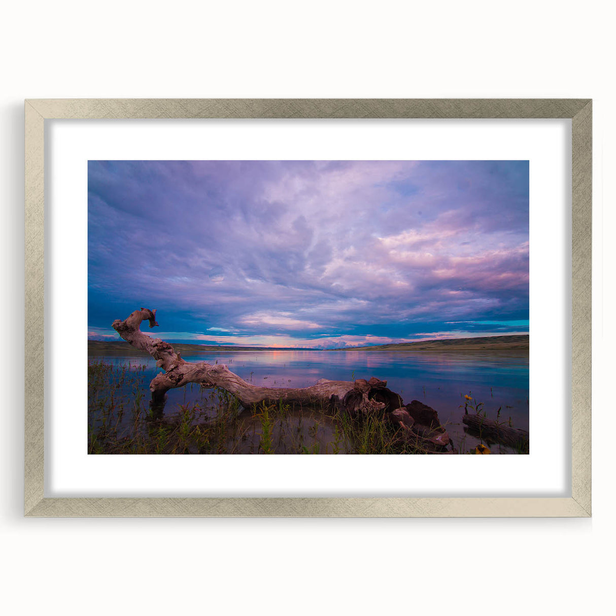Textured abstract art print of a Saskatchewan scenery in muted earth tones, framed in silver, ideal for bedroom art.
