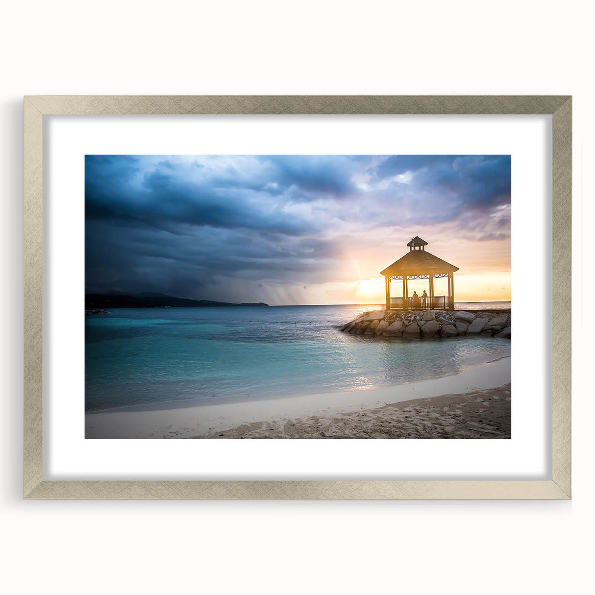 Extra large abstract art print depicting Caribbean scenery in muted blue and green tones, framed in silver.