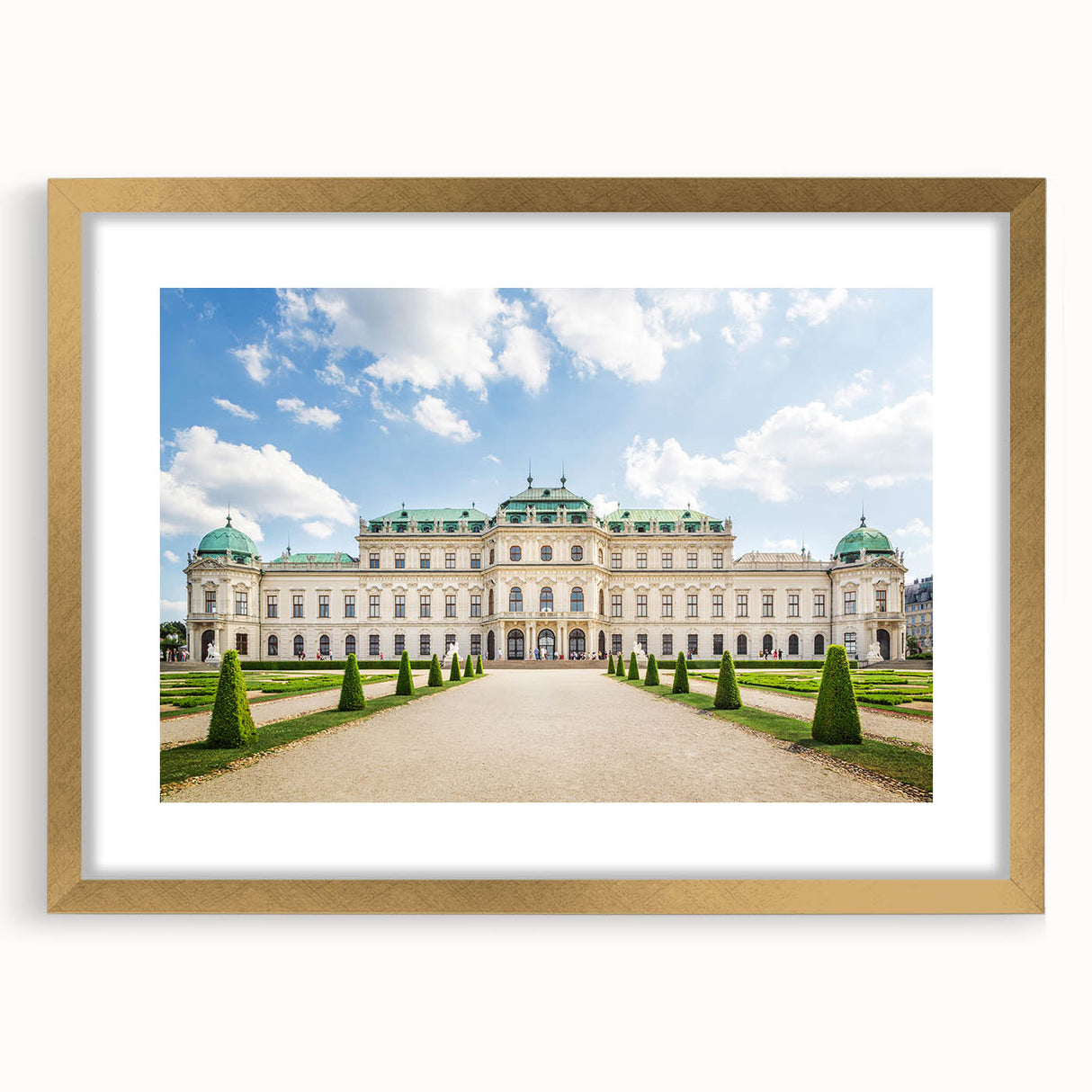 Abstract art print of a European landscape in muted gold and green tones, framed with a gold mat.