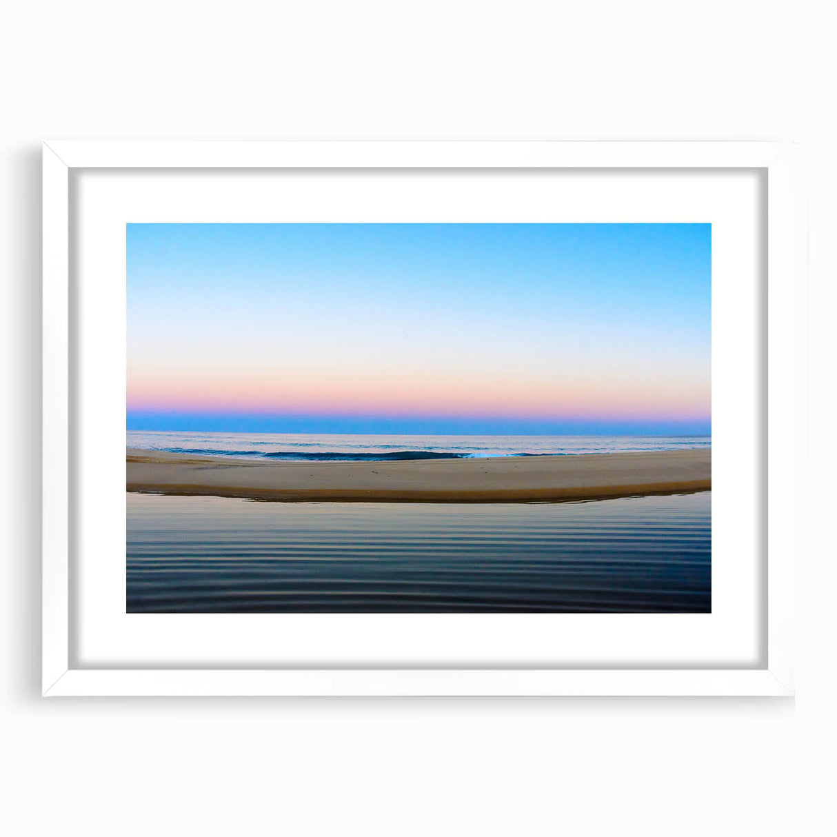 Abstract art print of Cabo San Lucas scenery in muted blue and white tones, framed with a white mat.