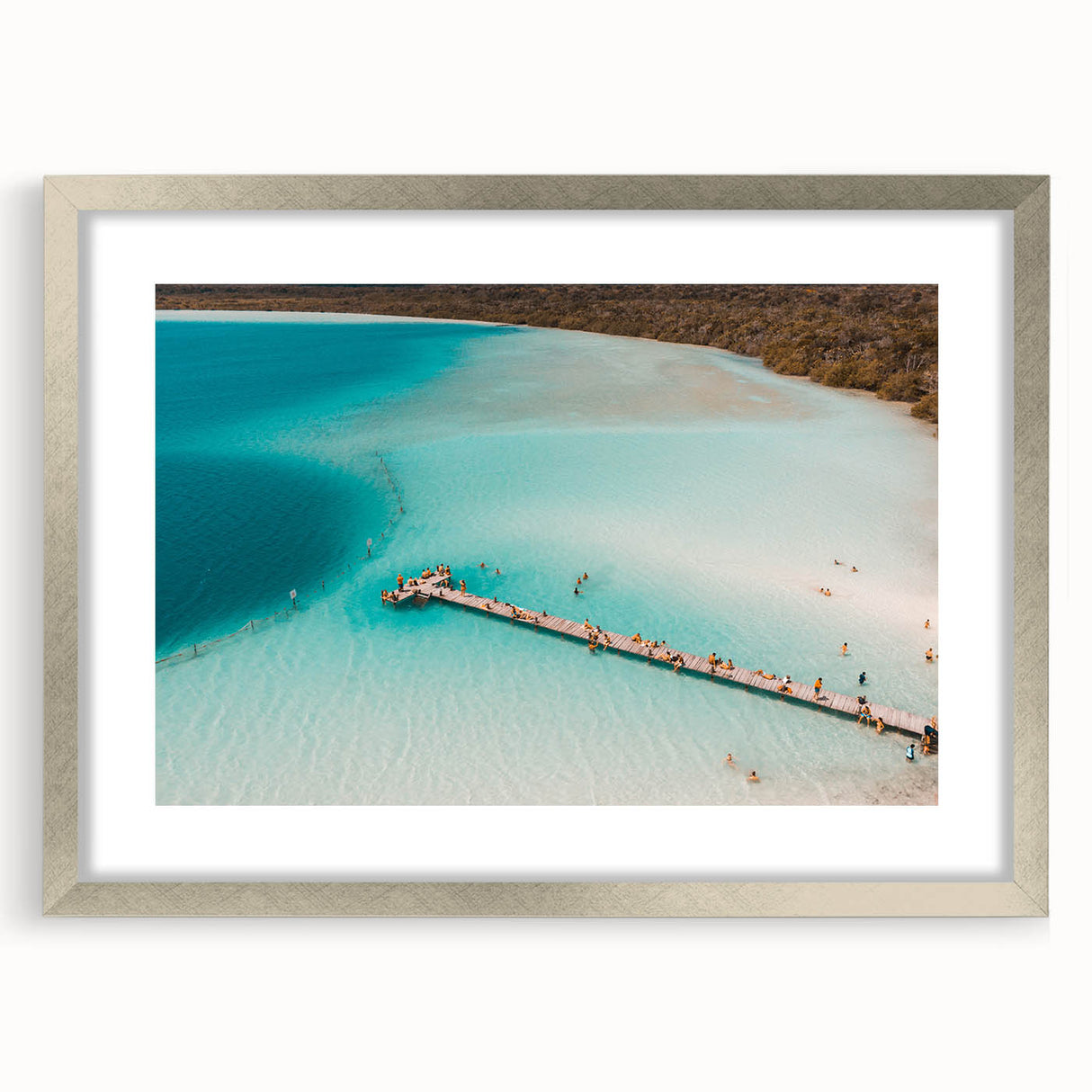 Textured abstract art print of Quintana Roo scenery in silver frame, with muted earth tones, ideal for bedroom wall decor.