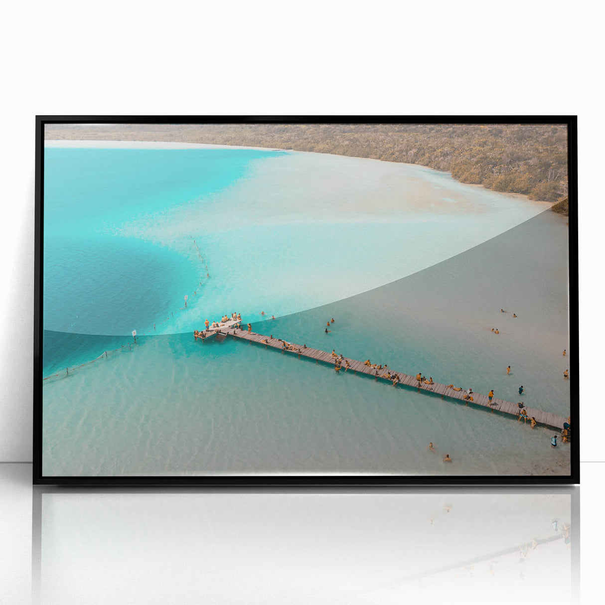 Large abstract wall art depicting a serene Quintana Roo scenery in muted blue and green, framed in black acrylic.