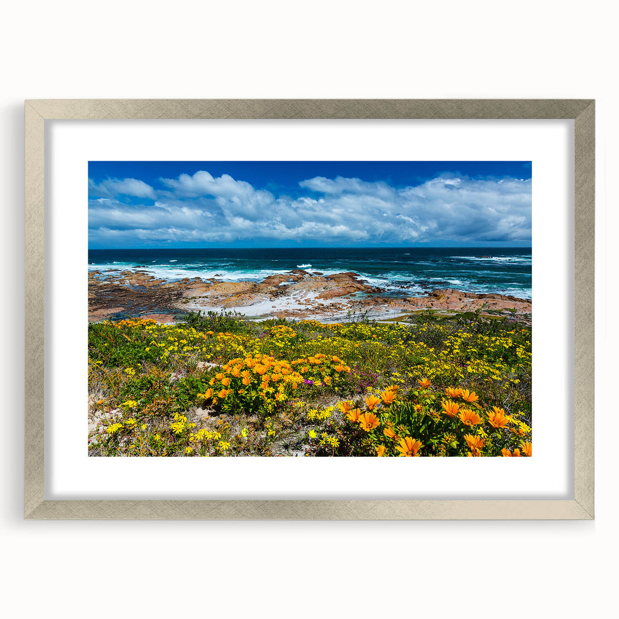 Textured abstract art print depicting a South African scenery in muted earth tones, framed in silver, ideal for bedroom art.