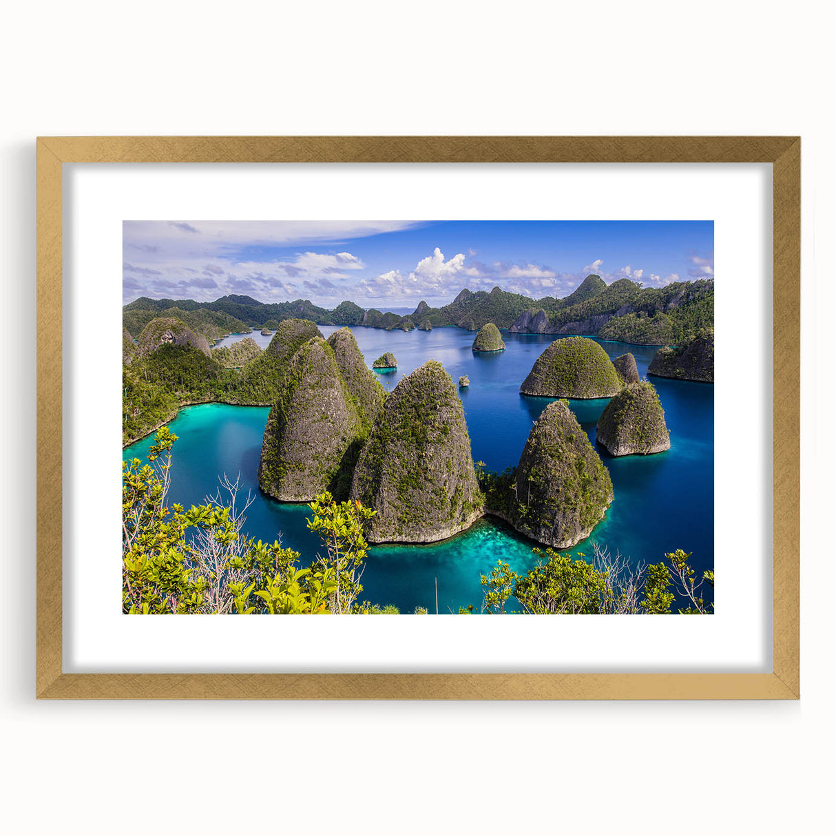 Extra large abstract art print of Indonesian scenery in textured gold frame, ideal for living room decor.