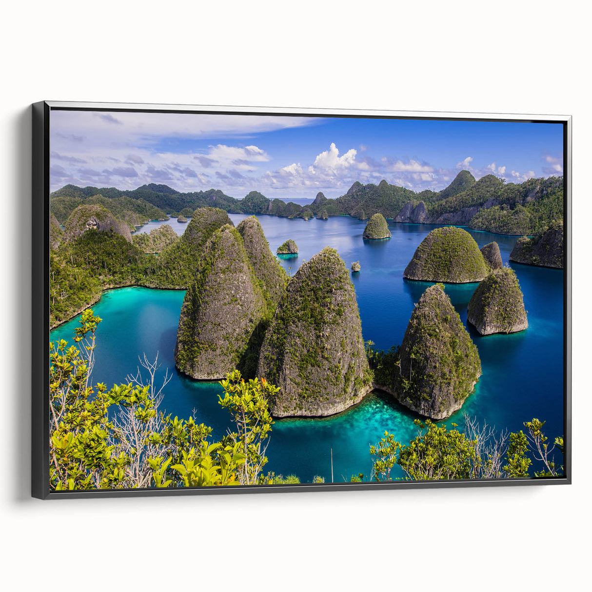 Black and white framed canvas of an Indonesian landscape, ideal for bedroom wall decor.