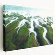 Side view of a large stretched canvas depicting a serene Taiwanese landscape in muted green and blue tones.