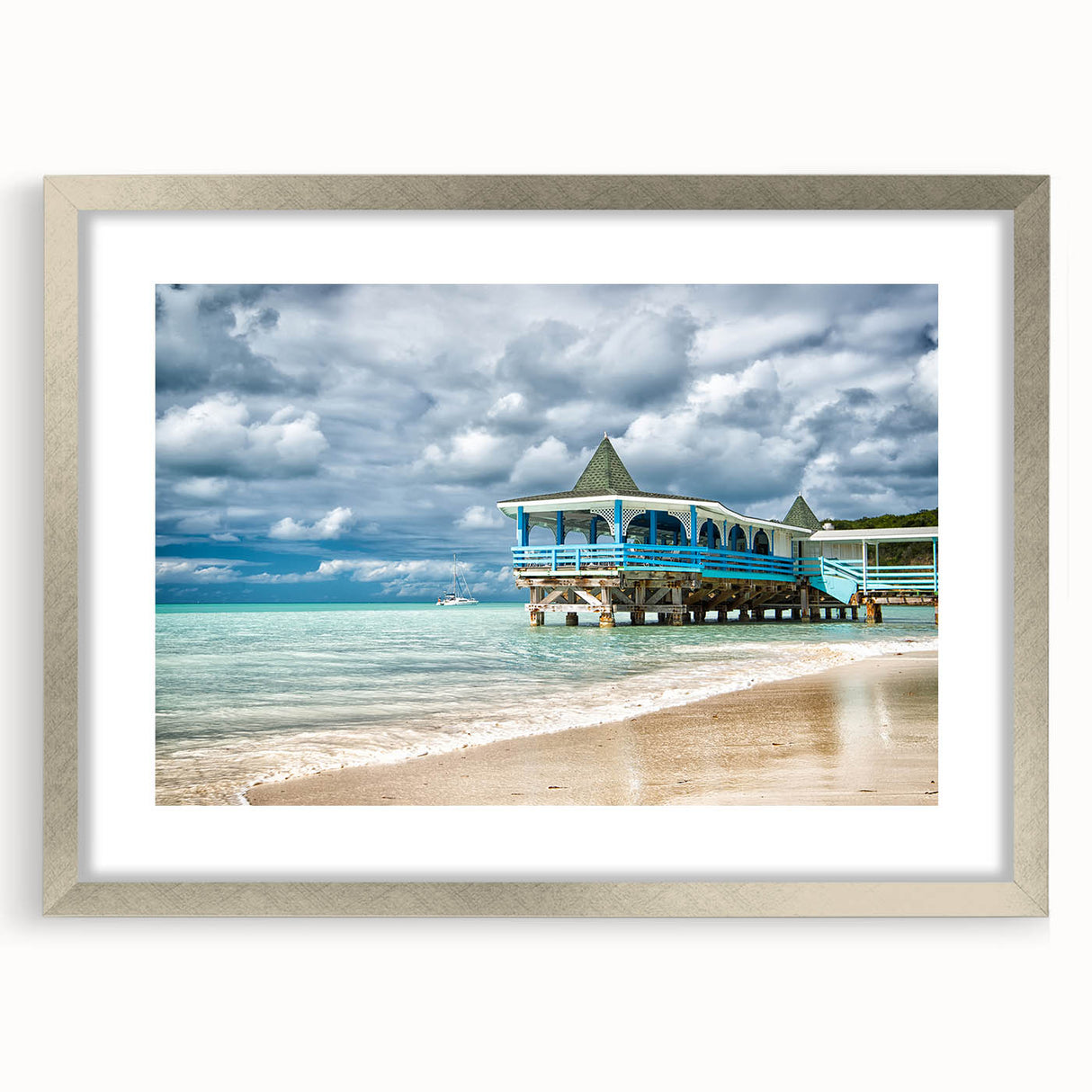 Extra large abstract art print depicting Caribbean scenery in vibrant blue and green tones, framed in silver.